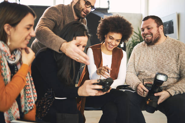 istock Educator showing attendees how camera works. Photography class concept. 1270295145