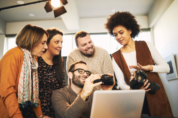istock Educator showing attendees how camera works. Photography class concept. 1270295168