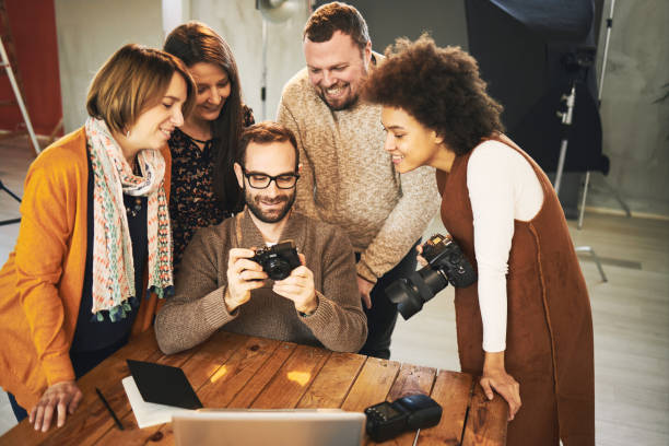 istock Educator showing attendees how camera works. Photography class concept. 1270295228