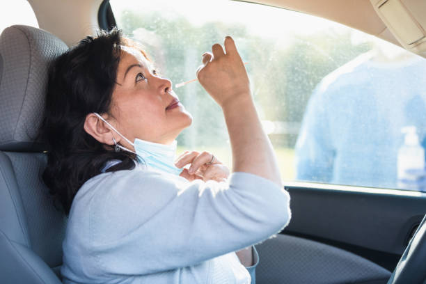istock Woman taking COVID-19 test 1270296116
