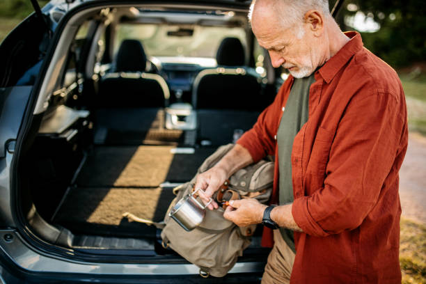 istock Senior man packing equipment need for hiking 1270296763