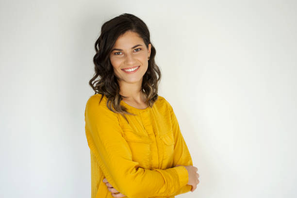 istock Beautiful girl with crossed arms looking at camera 1270299614