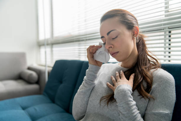 istock Depressed woman crying at home 1270299799