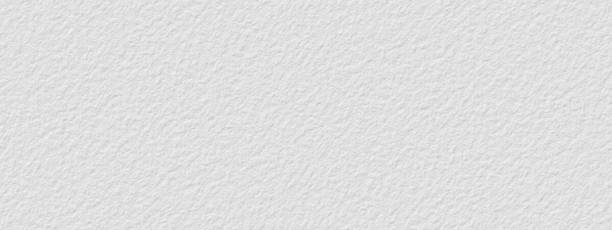 istock Abstract white stone wall, background - in the form of a rough embossed stone surface 1270300225