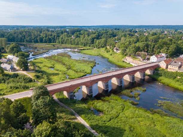istock Kuldiga historical red brick bridge. 1270301868