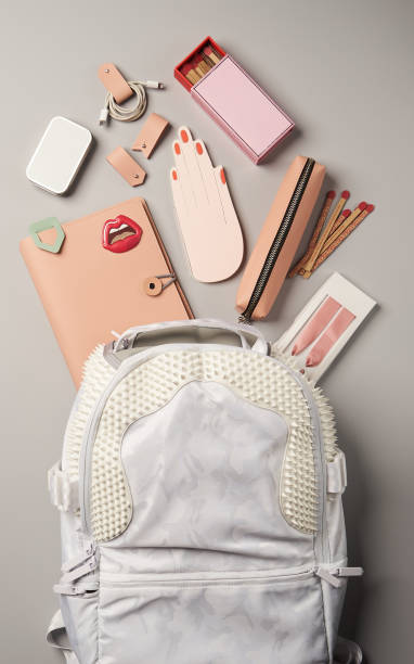 istock Women backpack and accessories on gray background 1270303631