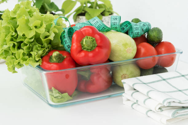 istock big transparent plate with vegetables: 1270304962