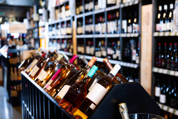istock Rack with various wine bottles in modern wine store waiting for customers 1270310862