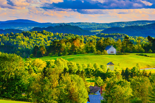 A small chapel sits at the edge of a green meadow in the Northeast Kingdom of Vermont.