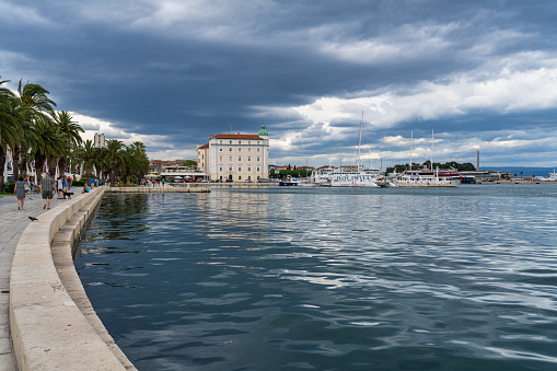 Splitska Riva Promenade with palm trees between the harbor and Diocletian s palace in Split, Croatia