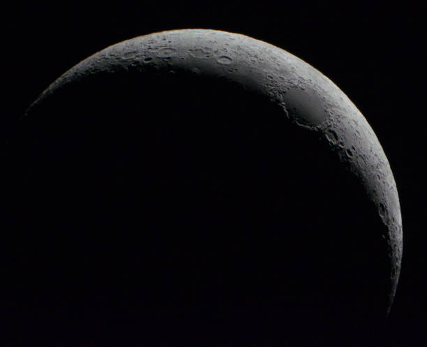istock Moon in last quarter with long shadows 1270313267