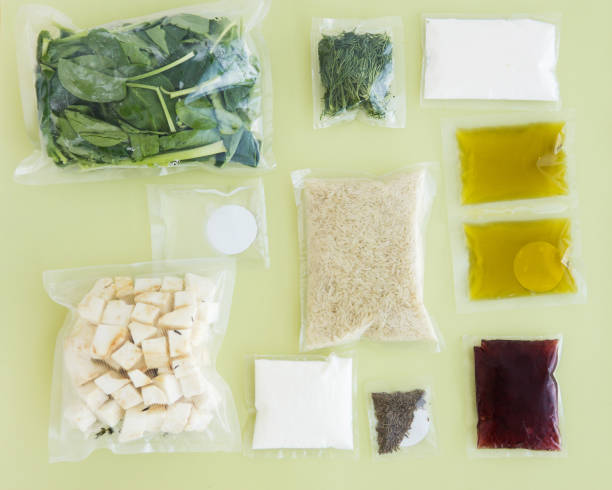 set of products for a vegetarian dinner: rice, spinach, celery, dill, Olive oil, sauces and spices. Set for delivery of food for dinner on a light background. Cooking at home, home cooking. stock photo