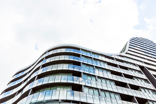 Low angle view of modern apartment building, Green Square, Sydney Australia, sky background with copy space, full frame horizontal composition