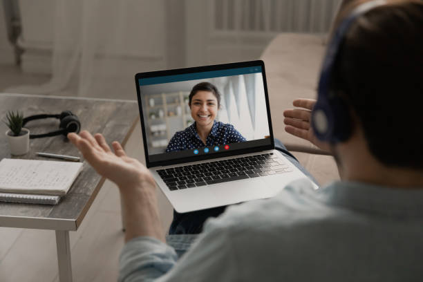 istock Man have webcam conference on laptop with colleague 1270316216