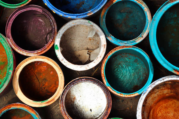 istock Old dirty metal paint cans as background 1270321680