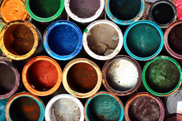 istock Old dirty metal paint cans as background 1270321681