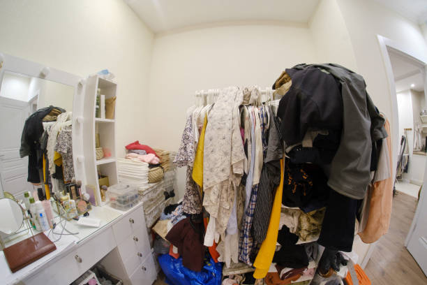 istock A room cluttered with clothes and a female dressing table with cosmetics, no closet 1270324719