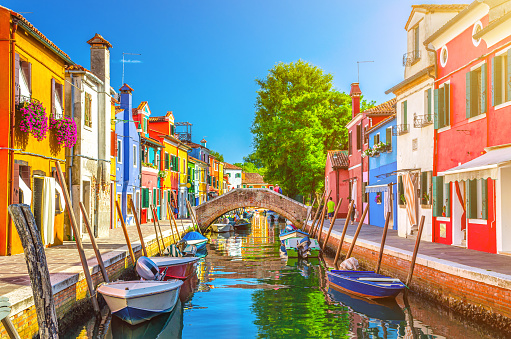 Burano island with colorful houses and narrow water canal