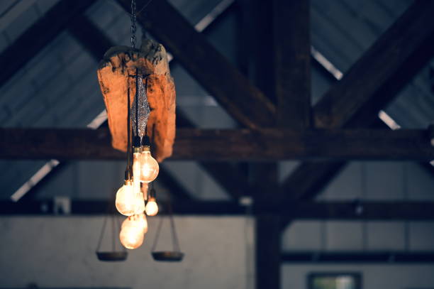 istock Orange light bulb on the ceiling at a cafe,idea concept 1270328804