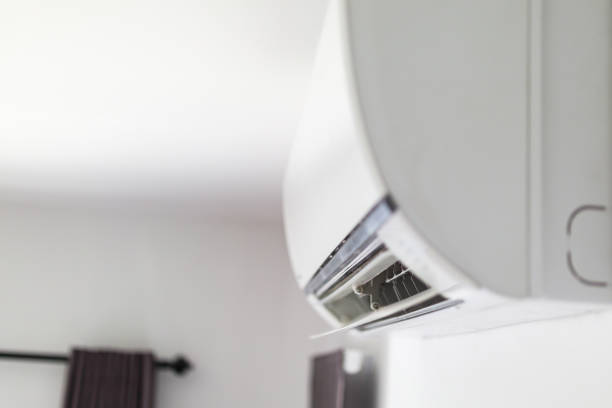 istock Air conditioner on white wall room interior background 1270334438