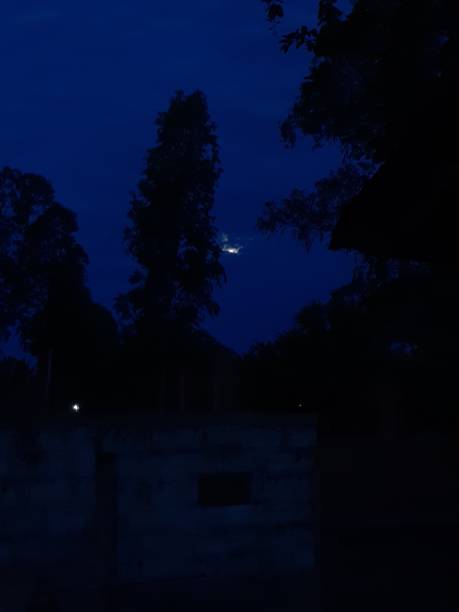 Early morning says goodbye to the moon! This shot captured in the behind of my home when get up early in morning and see through the window . The idea was get in there """. denish stock pictures, royalty-free photos & images