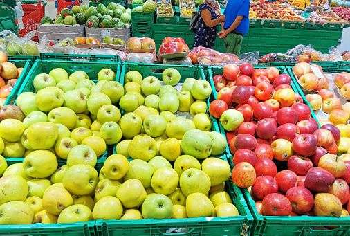 Torrevieja, Spain, September 2020 Shelf with fruits and ripe apples on a farm market