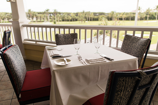 Elegant Dining Table Decor at an Outdoor Restaurant at a Golf Course in Palm Beach, Florida