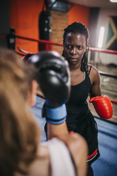 istock Women Boxing At Gym 1270344080