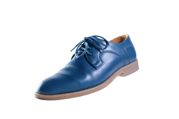 istock Blue leather shoes in perspective and isolated on white 1270344153