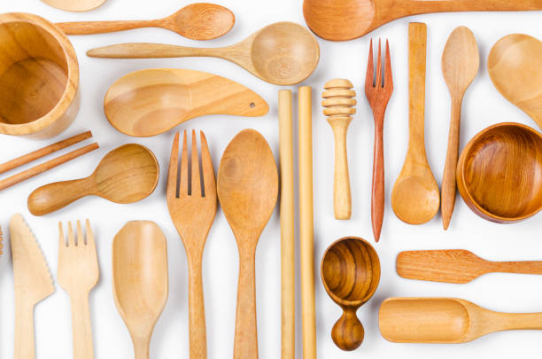 istock Set of the wooden kitchen utensils on white background. 1270346145