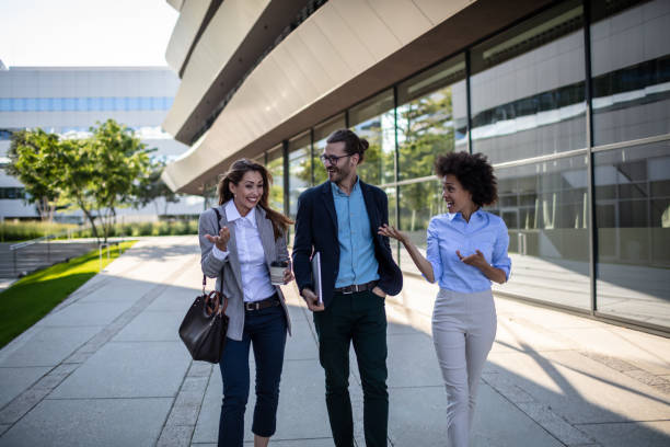 istock Business people waking outside office building 1270349951