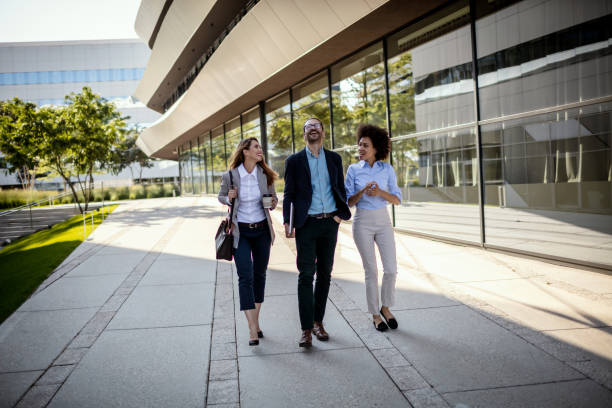 istock Business people waking outside office building 1270349987
