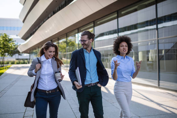 istock Business people waking outside office building 1270350020