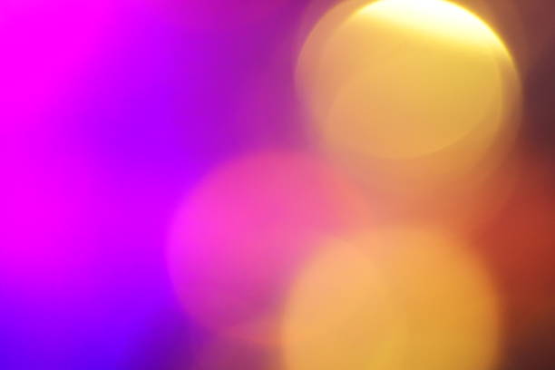 Natural lighting lamp rays bokeh effect. Multicolored light leaks on black background. Lens studio flare leak burst overlays.