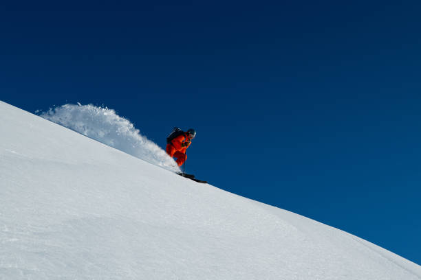 istock Powder skiing at resort 1270354620