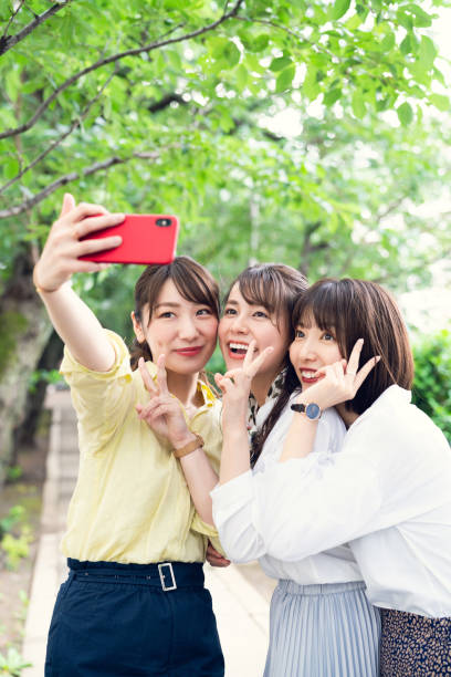 istock Group of asian woman taking a selfie. 1270357646