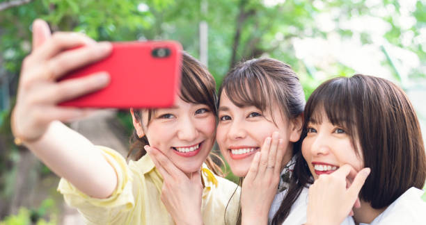 istock Group of asian woman taking a selfie. 1270358399