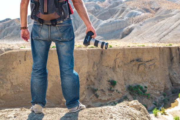 istock Nature photographer on mountain range 1270358413