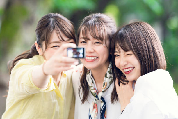 istock Group of asian woman taking a selfie. 1270358423