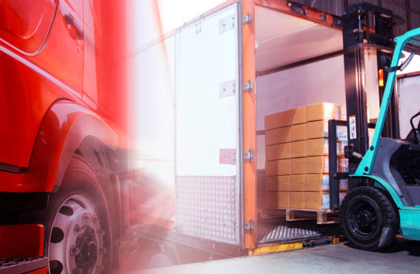 istock Double exposure of forklift loading goods pallet into container truck. Cargo freight, Shipment, Logistics and transportation. 1270361119