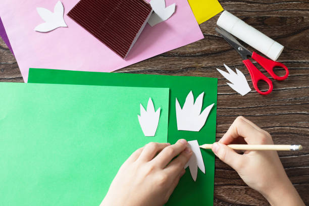 istock Step 5 instruction. Greeting card for mother's day with spring flowers crocuses. Handmade Paper Craft Ideas. The project of children's creativity, crafts, crafts for children. 1270364162