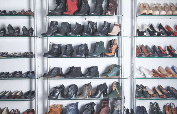 istock Elegant leather female boots in the store. 1270364446