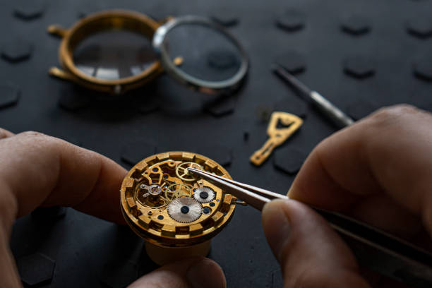 Watchmaker's workshop, mechanical watch repair. SPecial repair kit Watchmaker's workshop, mechanical watch repair. SPecial repair kit, close up swiss watches stock pictures, royalty-free photos & images