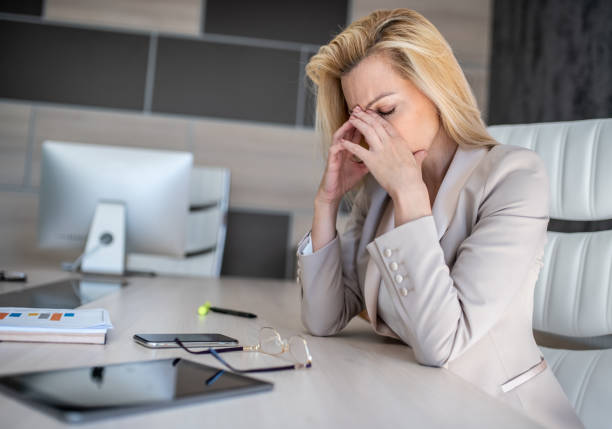 istock A business woman is sitting in her office thinking about how to solve the problems that arose on the project at work 1270367540