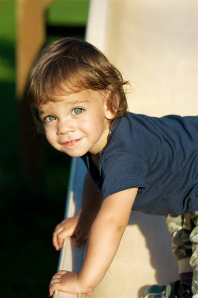 istock Cute boy in the garden 1270368617