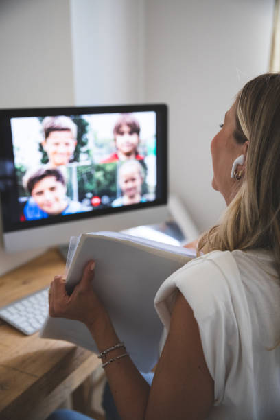 istock Teacher having class from home to young students 1270370303