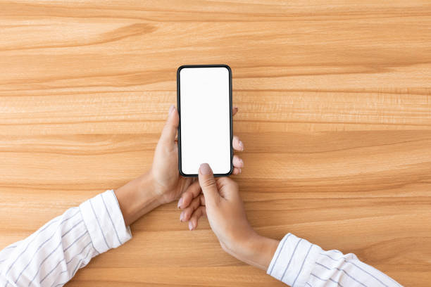 istock Shot of lady using her smart phone with white screen 1270373142