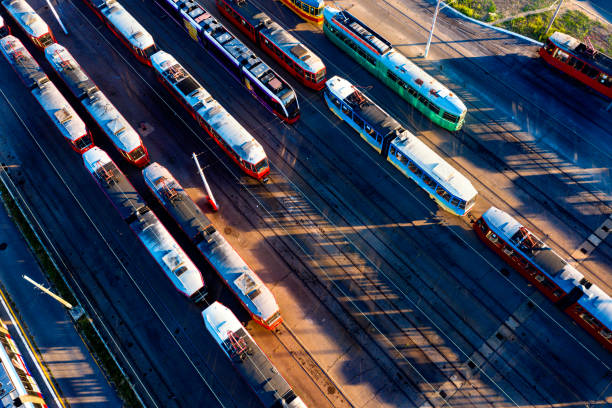 istock Trams with their shadows in the parking lot 1270381930