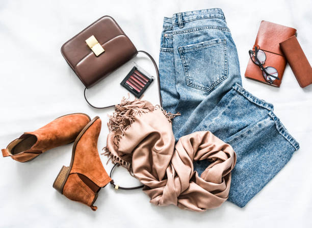 istock Women's clothing and accessories on a light background, top view 1270381972