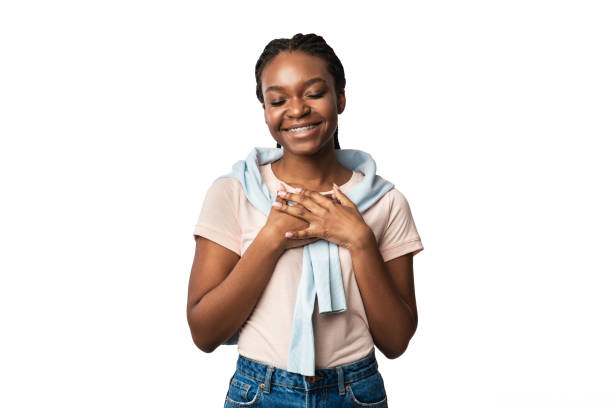 istock Black Woman Pressing Hands To Chest Expressing Gratitude, White Background 1270383320